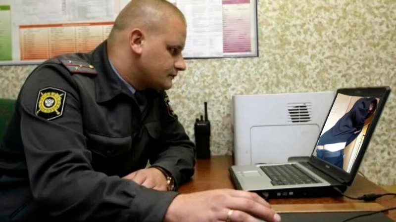 Create meme: a police officer , a policeman at the computer, the police of Russia