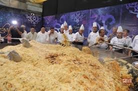 Create meme: plov in Uzbekistan, pilaf Guinness world record Tashkent, the biggest rice in the world
