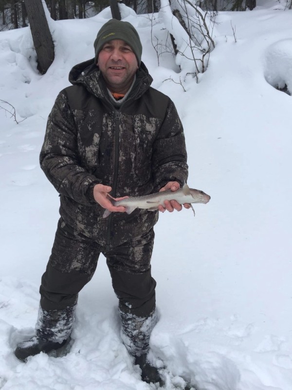 Create meme: winter fishing , fishing on the Irtysh in winter, male 