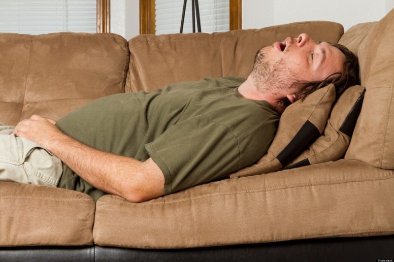 Create meme: a man is lying on the couch , a man lies on the sofa, sleep