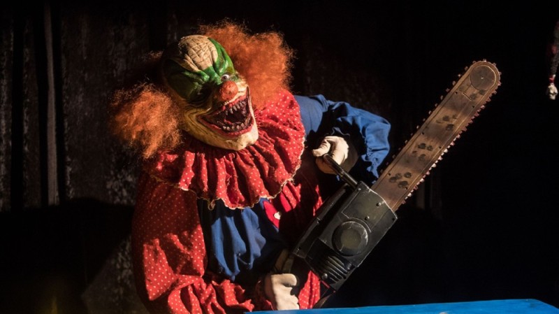 Create meme: fantasy horror, a clown with a chainsaw, circus of horrors