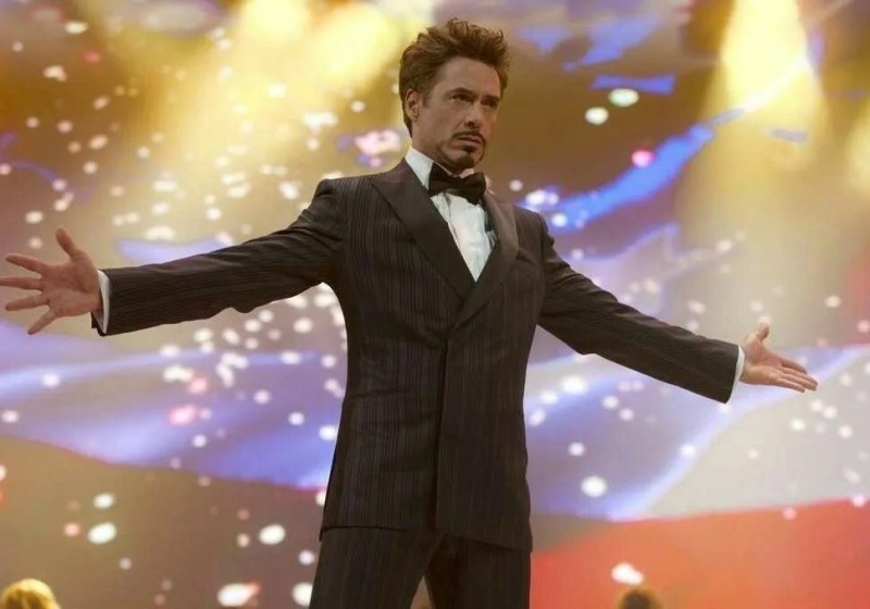 Create meme: Robert Downey Jr. on stage, Robert Downey , Robert Downey Jr. throws up his hands