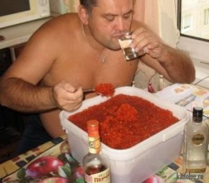 Create meme: guy eats caviar, eats caviar, red caviar