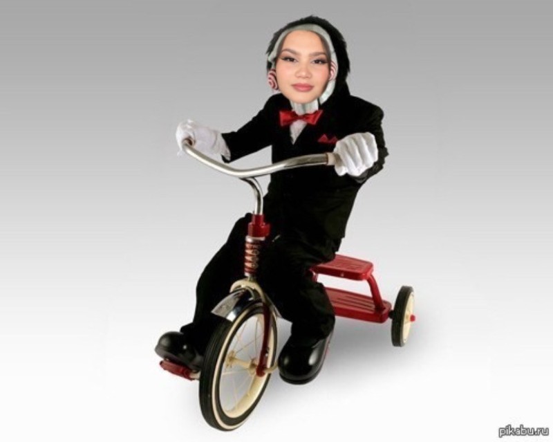 Create meme: saw on a bicycle meme, saw on the bike, Billy doll on the bike