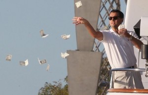 Create meme: DiCaprio throwing money, DiCaprio throws money, DiCaprio throws money