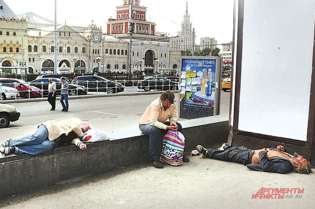 Create meme: homeless people in the square, a homeless man in Russia, homeless in Moscow