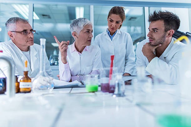 Create meme: a group of scientists, scientists in the laboratory, male 