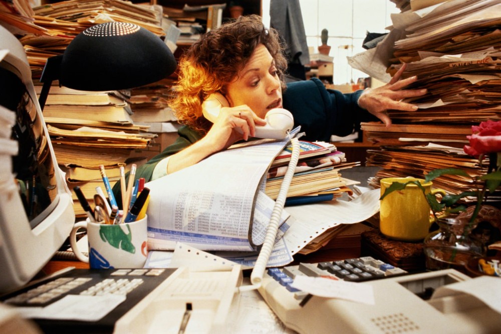 Create meme: workaholic, mess on the table, accountant's work