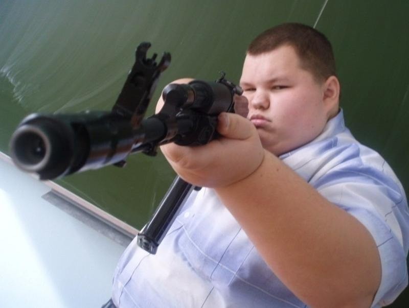 Create meme: Kurchanov with a gun is an evil meme, schoolchildren with guns, memes with a gun