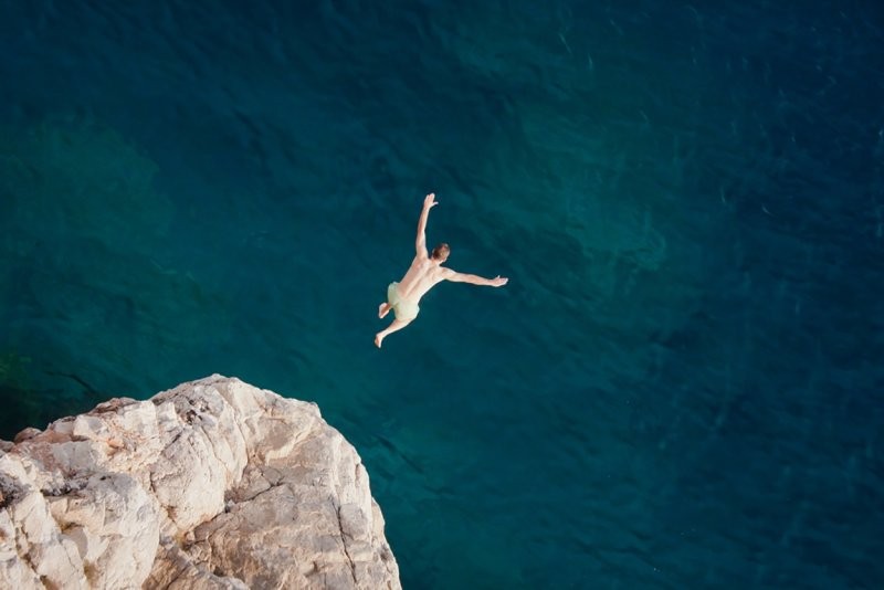 Create meme: jump into the water from a cliff, jump into the sea, jump off a cliff