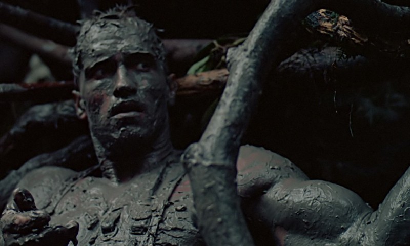 Create meme: predator film 1987 Arnold, Predator 1987 Arnold Schwarzenegger in the Mud, Arnold Schwarzenegger is a predator