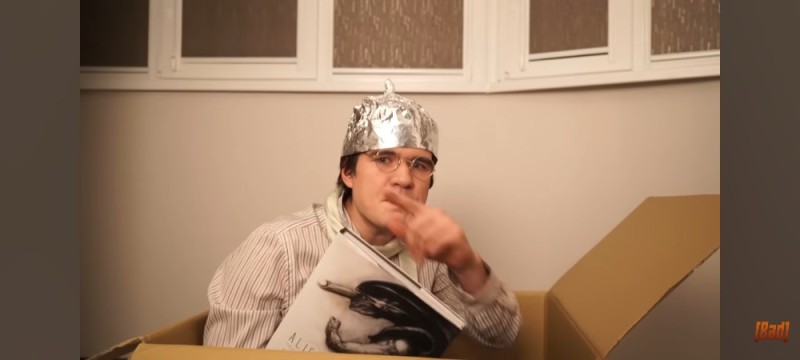 Create meme: badcomedian in a foil hat, foil cap, Eugene badcomedian