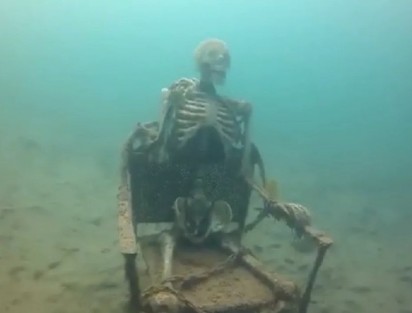 Create meme: findings under water, the skeleton at the bottom of the meme, terrible finds under water