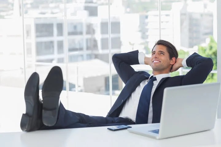 Create meme: The man put his feet up on the table, businessman , the man in the office