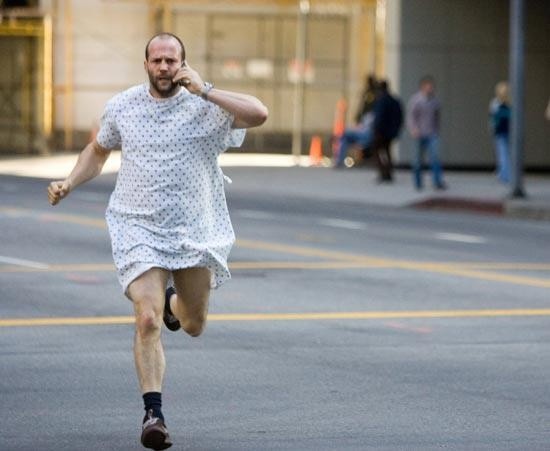 Create meme: Jason Statham runs away in a dress, Statham adrenaline in a bathrobe, adrenaline Jason Statham runs