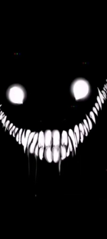 Create meme: a sinister smile on a black background, scary smile, the evil smile of a demon