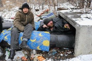 Create meme: bums on a heating, the homeless in Russia, homeless