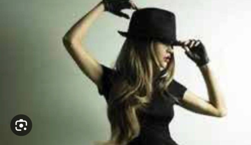 Create meme: irina bilyk, girl in a black hat, nikolaevna