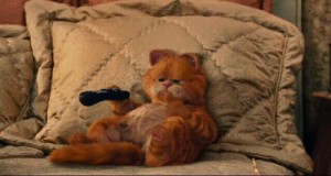 Create meme: two cats, love on the couch, Garfield 2