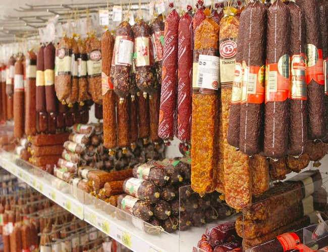 Create meme: sausage display in the window, Yeletsky sausages meat processing plant Yeletsky, sausage on the counter