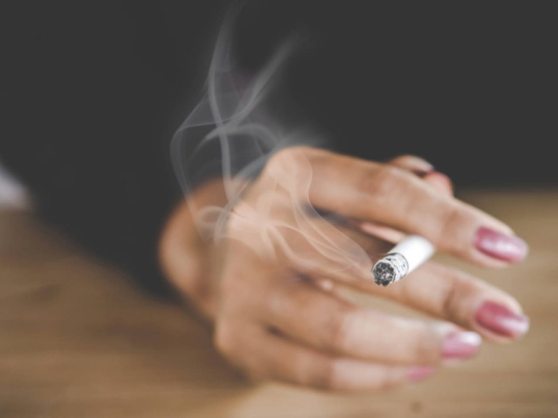 Create meme: with a cigarette, hand with a cigarette, a woman's hand with a cigarette