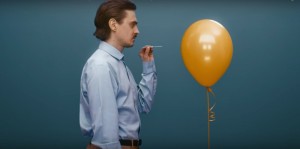 Create meme: balls, balloon, man blowing on the ball