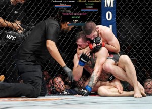 Create meme: Habib Connor suffocating, Khabib Nurmagomedov smothers Conor McGregor, pictures of Habib Nurmagomedov ufc 229 after the fight