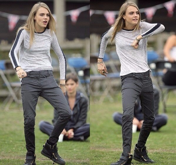 Create meme: Cara Delevingne's walk, Cara Delevingne Gopnik, Cara Delevingne is a drug addict