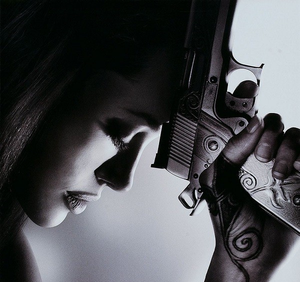 Create meme: girl with a gun, especially dangerous, Angelina Jolie with a gun