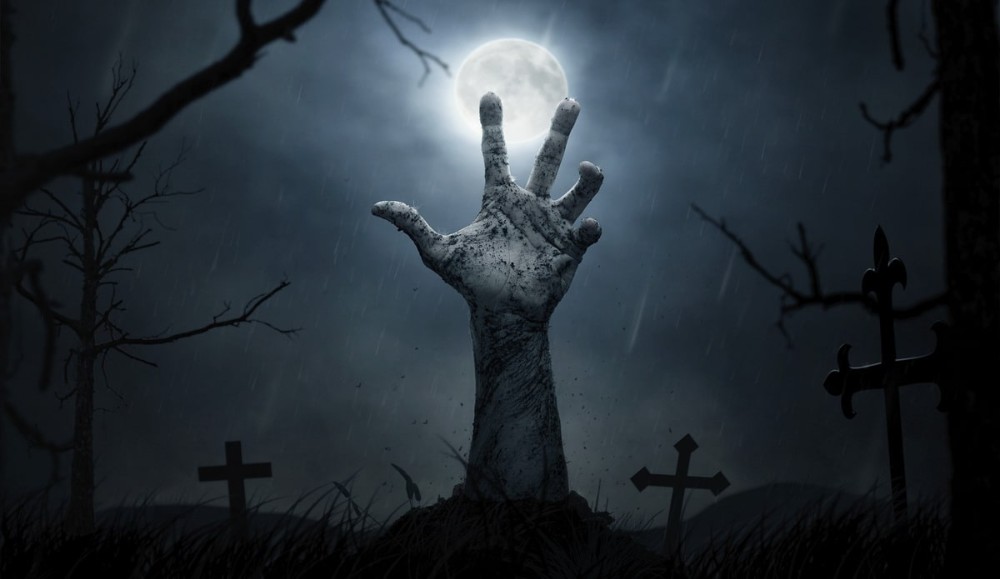 Create meme: a zombie rises from the grave, hand from the grave, A zombie is coming out of the grave