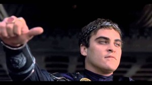 Create meme: Gladiator thumbs down, thumbs down Gladiator GIF, Joaquin Phoenix Commodus