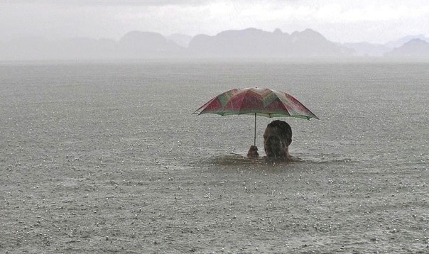 Create meme: rain on the sea, Vasyukov Evgeny Andreevich, umbrella in the rain