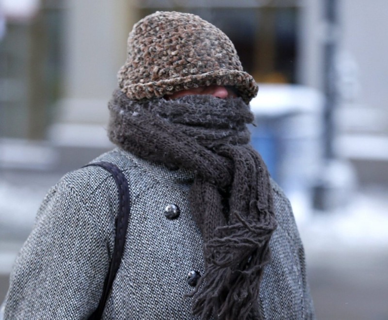 Create meme: A wrapped-up man on the street in winter, wrapped in a scarf, The bundled up man