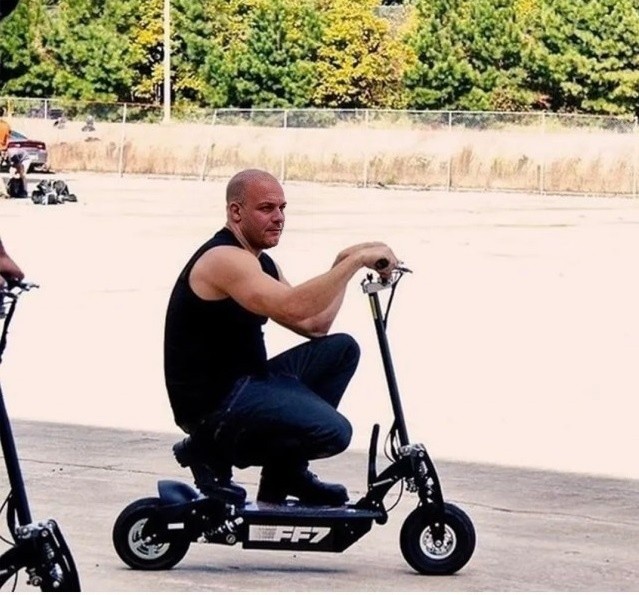 Create meme: electric kick scooter, electric scooter humor, Vin diesel on a scooter