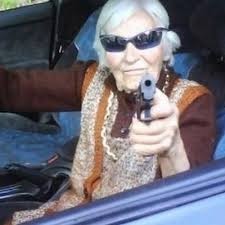 Создать мем: злая бабка, бабушка с пистолетом, пули от бабули