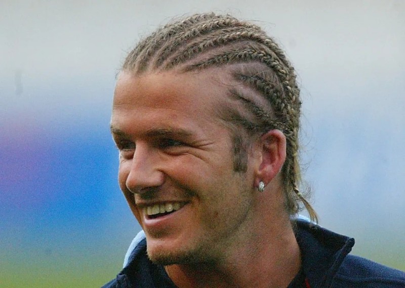 Create meme: David Beckham afro pigtails, David Beckham hairstyle, David Beckham pigtails