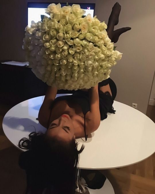 Create meme: girl with flowers, the girl with flowers without a face, the bouquet is gorgeous
