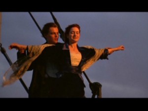 Create meme: Titanic 1997 film the scene on the ship's bow, the film Titanic moment on the bow, the 1997 Titanic movie rose and Jack