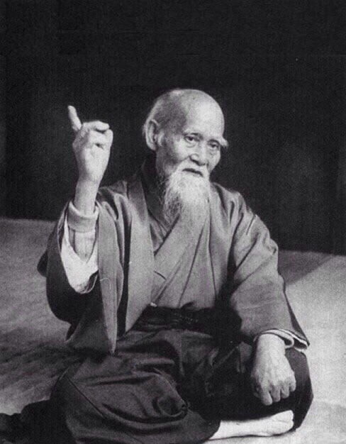 Create meme: Morihei Ueshiba with a finger, morihei ueshiba meme, meme monk