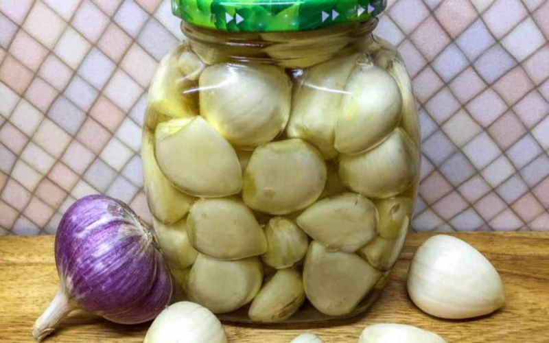 Create meme: pickled garlic, garlic in a jar, garlic