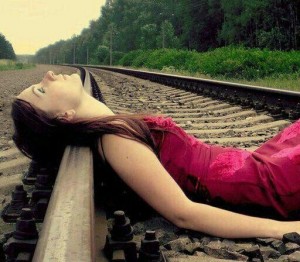 Create meme: girl, girl lying on the railroad, Girl