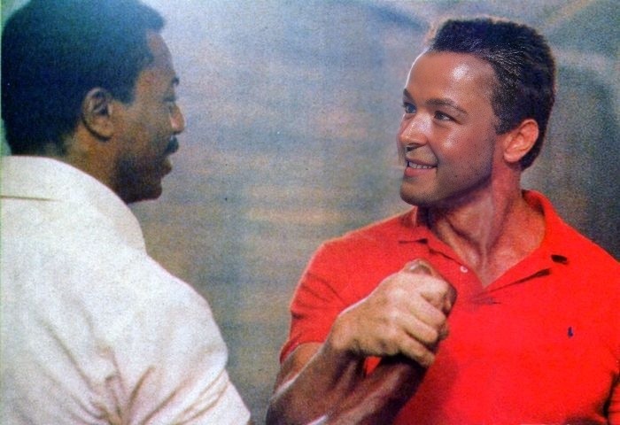 Create meme: Carl Weathers and Arnold, arnold schwarzenegger handshake, a frame from the movie