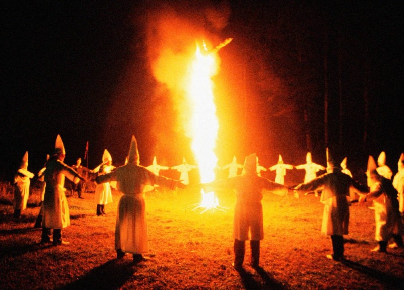 Create meme: Ku Klux Klan bonfire, The Kuklus clan by the campfire, KKK Ku Klux Klan burning