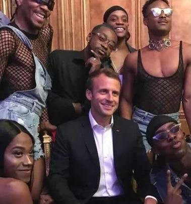 Create meme: Macron with the blacks, Surrounded by blacks, Emmanuel macron and Negros