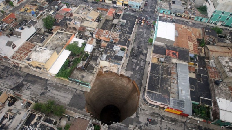 Create meme: a sinkhole in the ground, sinkhole in guatemala 2010, a huge hole