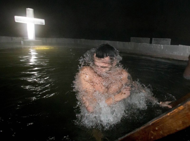 Create meme: bathing in an ice hole for epiphany in Russia, bathing baptism, the font for baptism