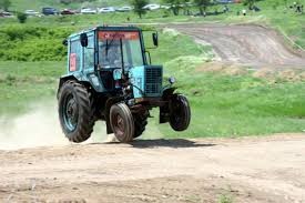 Create meme: fun with tractors, racing on tractors, drunk tractor driver
