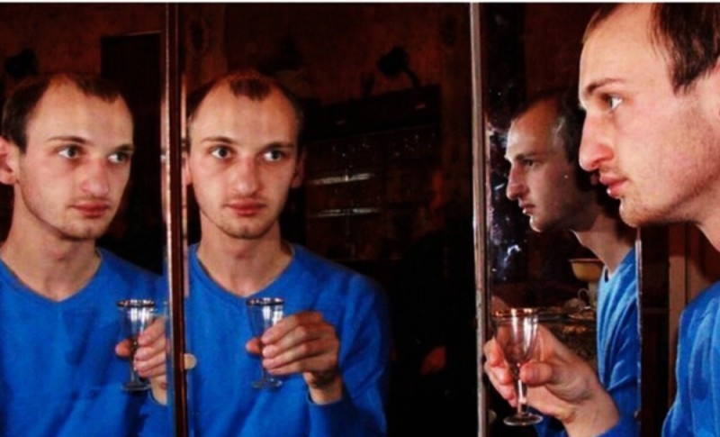 Create meme: male , A man drinks with a reflection of a meme, thumps with mirror