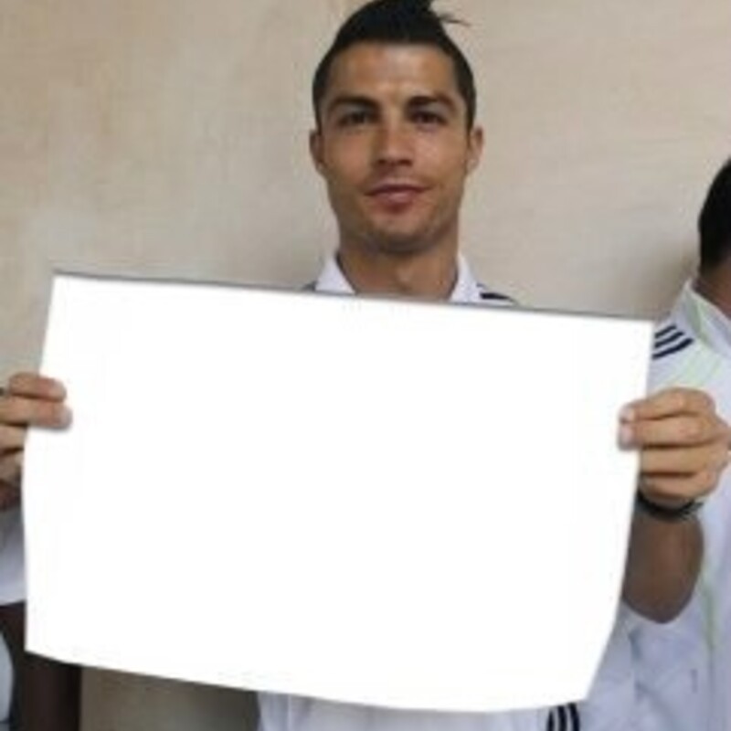 Create meme: Ronaldo holds a piece of paper, ronaldo with a sign, ronaldo Cristiano with a piece of paper