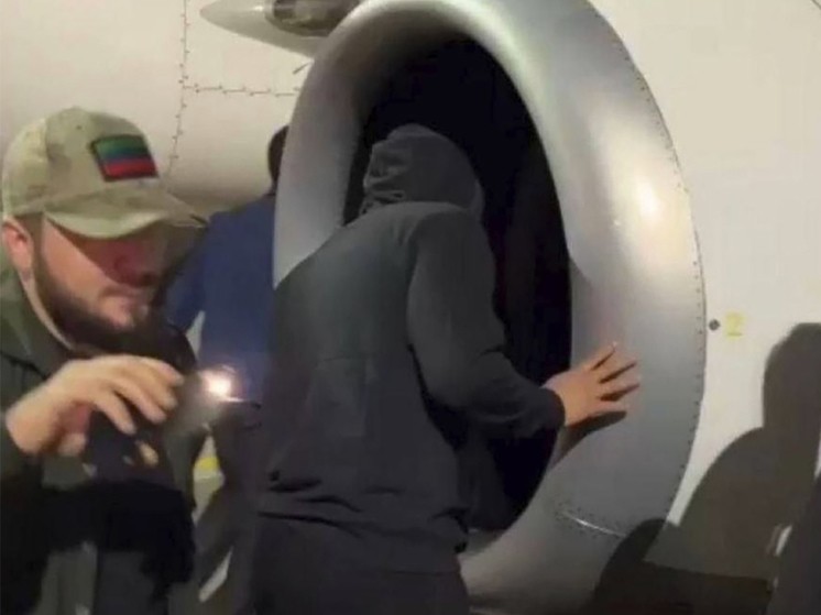 Create meme: a man was sucked into the turbine of an airplane, sucked into the turbine of the plane, on Board 